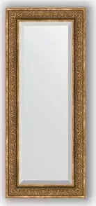 Зеркало Evoform с фацетом в багетной раме Exclusive 59x139 см, вензель бронзовый 101 мм (BY 3526)